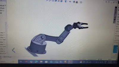 تصميم وتنفيذ روبوت ارم عن طريق solidworks  وتم طباعته 3d printing