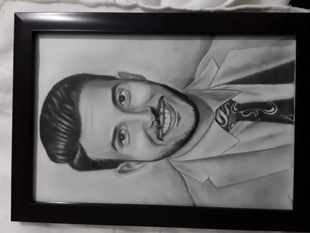 عمل بورتريه للشخص او لمجموعة افراد بالرصاص او الفحم